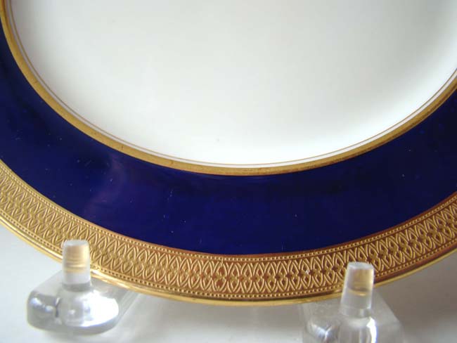 A fine set of 12 bone china 8 1/4" dessert plates with gilt decoration made by Lenox for TIFFANY & CO., c. 1920-1950. — image 2